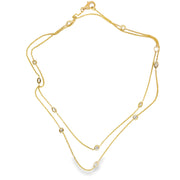 Diamond set yellow gold chain with marquise and round brilliant diamonds