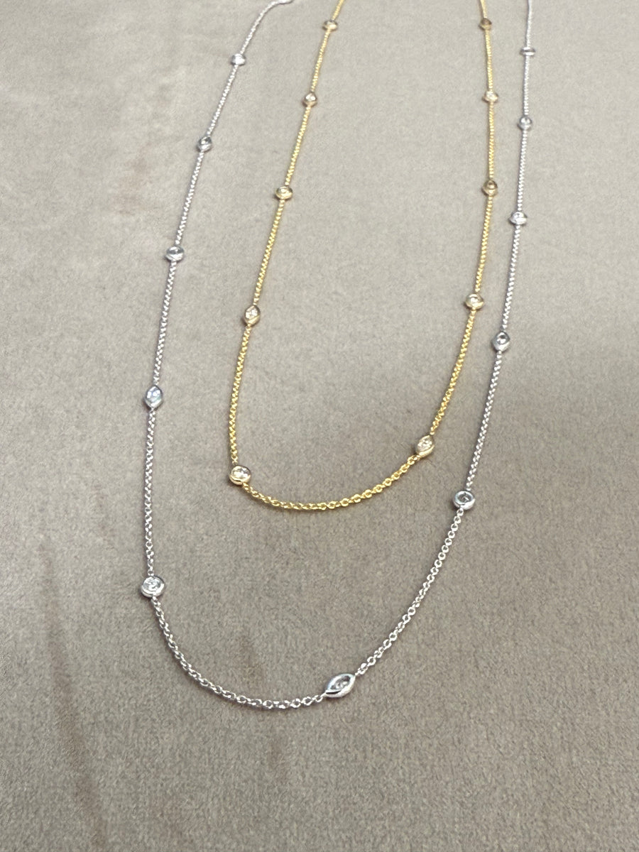 White gold Necklace with round and marquise diamonds