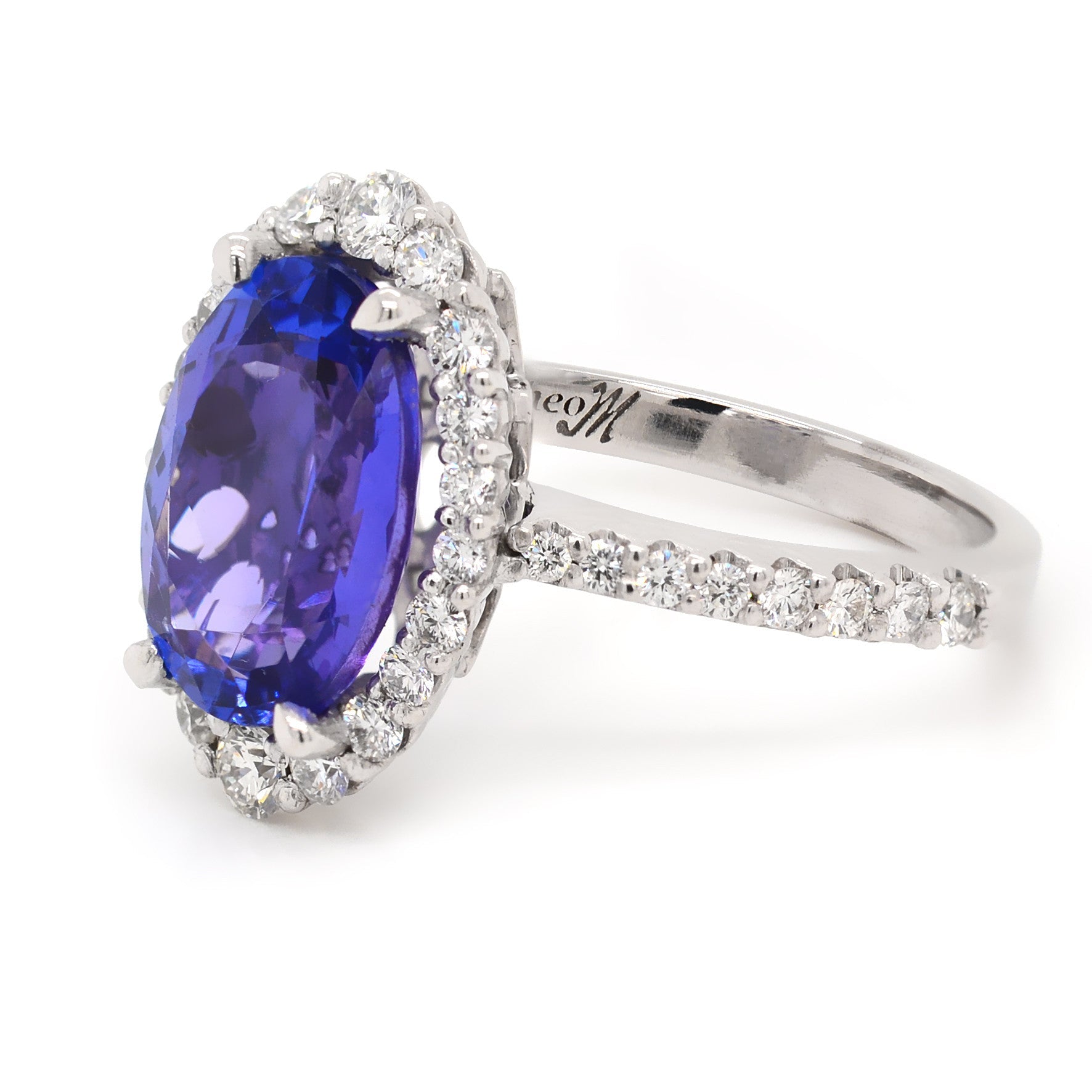 Oval Tanzanite Ring with a Diamond Halo - ForeverJewels Design Studio 8