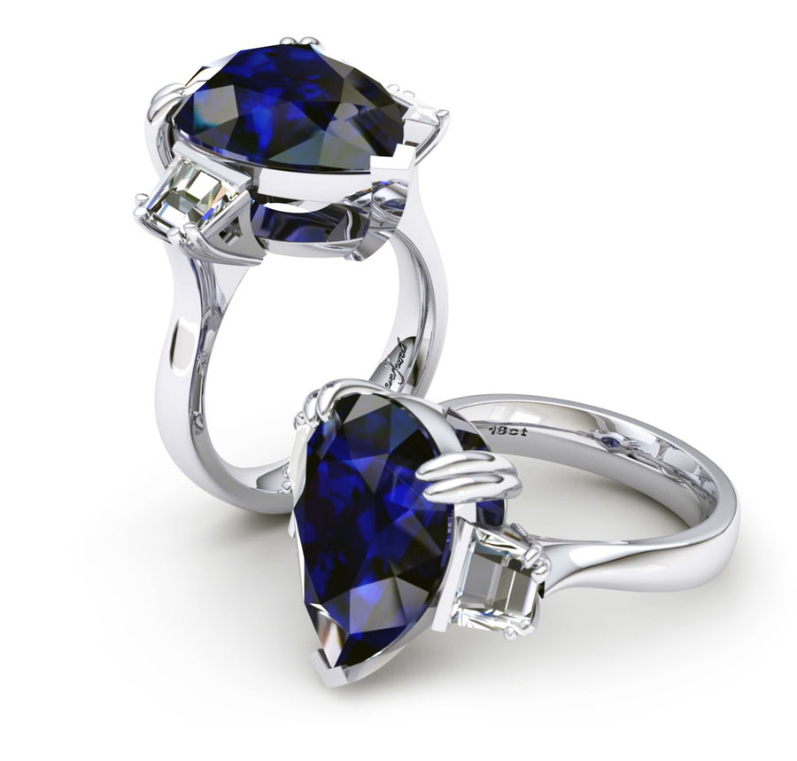18ct White gold pear cut tanzanite dress ring with baguette diamonds