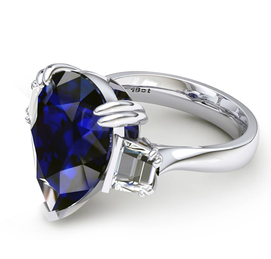 18ct White gold pear cut tanzanite dress ring with baguette diamonds