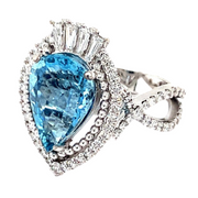 Pear shaped Aquamarine and Diamond Halo Ring