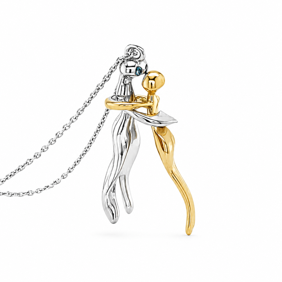 Man and woman split pendant in 18k two tone gold 
