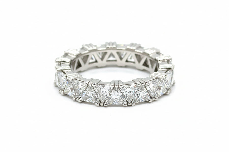 Diamond ring with intricate design on a white background