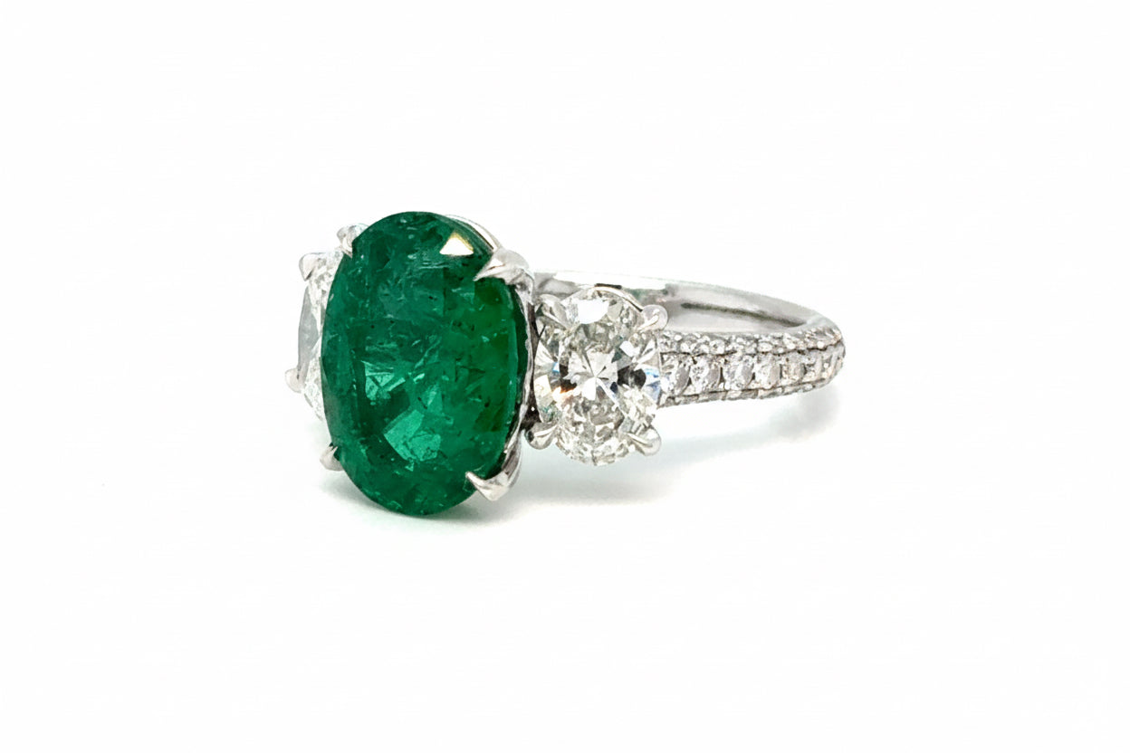 Trilogy Oval Emerald and diamond white gold ring