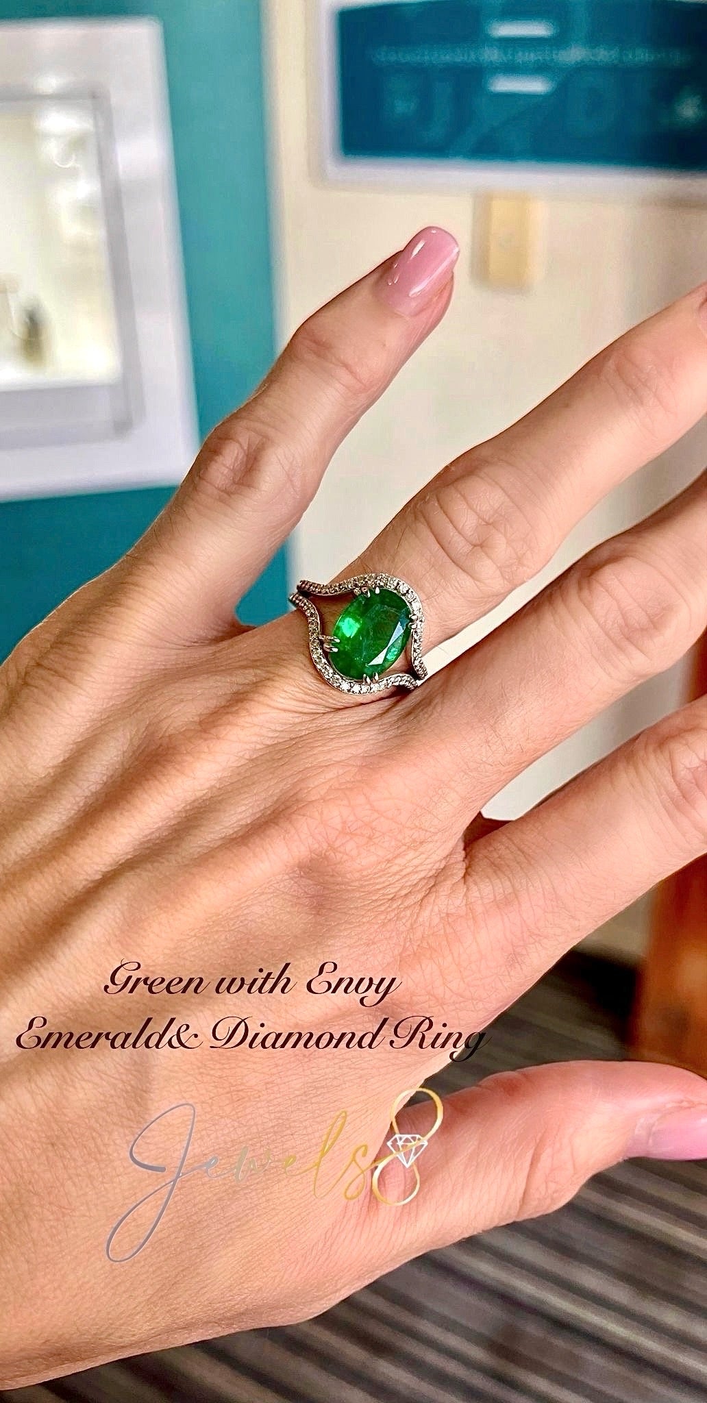 Oval Emerald Dress Ring with a Split Diamond Shank Oval Emerald Dress Ring with a Split Diamond Shank