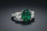 Trilogy Oval Emerald and diamond platinum ring