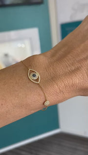 Blue eye diamond and blue sapphire yellow gold bracelet