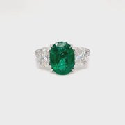 Trilogy Oval Emerald and diamond white gold ring
