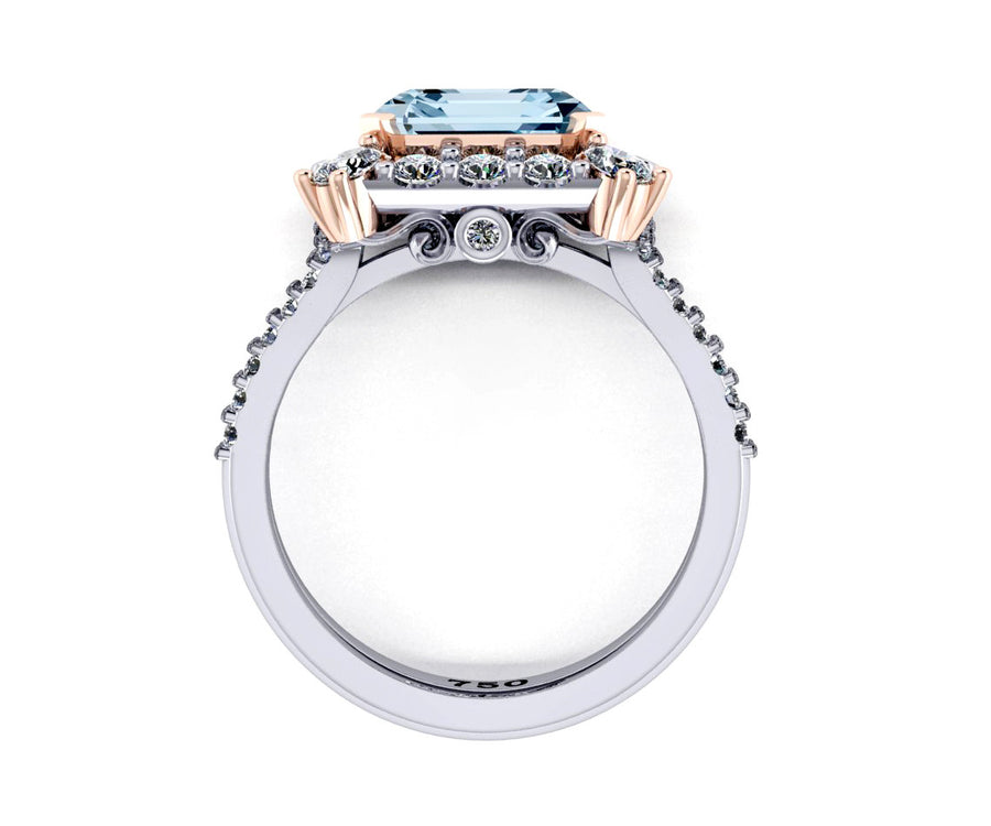 18ct White and rose gold emerald cut Aquamarine and Diamond halo Ring