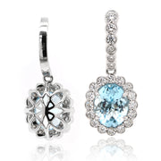 Oval Aquamarine Drop Earrings with a Halo of Diamonds