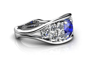 18ct White gold pod ring with a round tanzanite and diamonds