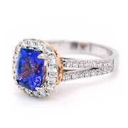 18ct White gold cushion cut tanzanite ring with a halo of diamonds