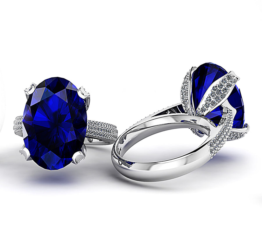 18ct White gold 15ct oval tanzanite dress ring claw set with pave diamonds