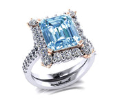 18ct White and rose gold emerald cut Aquamarine and Diamond halo Ring