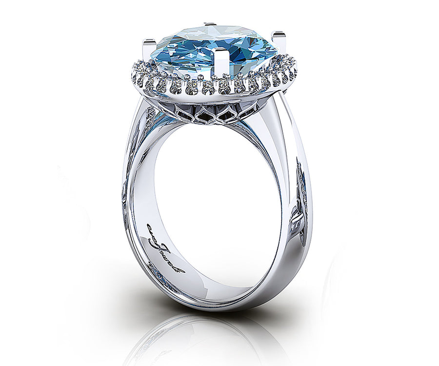 Oval Aquamarine Dress Ring with a Halo of Diamonds