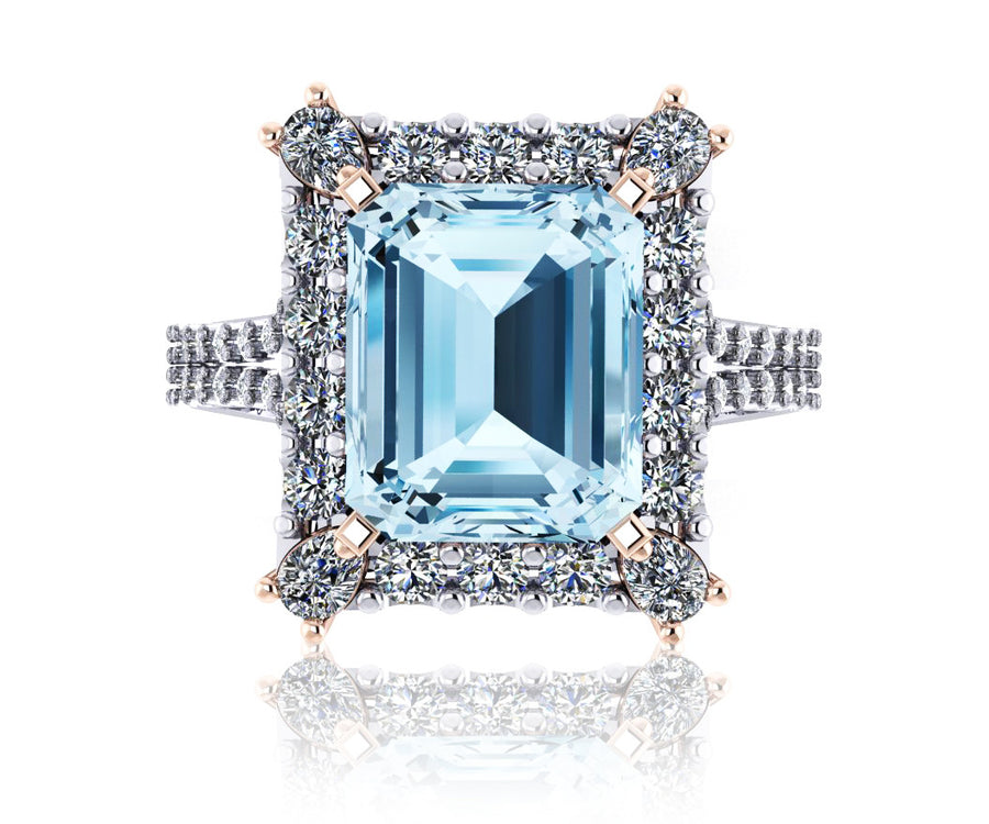 18ct White and rose gold emerald cut Aquamarine and Diamond halo Ring