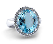 Oval Aquamarine Dress Ring with a Halo of Diamonds