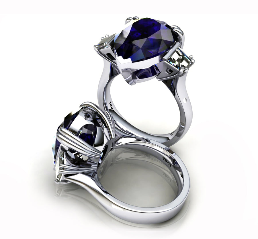 18ct White Gold Pear Cut Tanzanite Ring with Two Trapezoid Diamonds