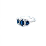 Trilogy  blue Sapphires and Diamond halo Ring