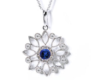 Diamond Flower Pendant with a Centre Blue Sapphire