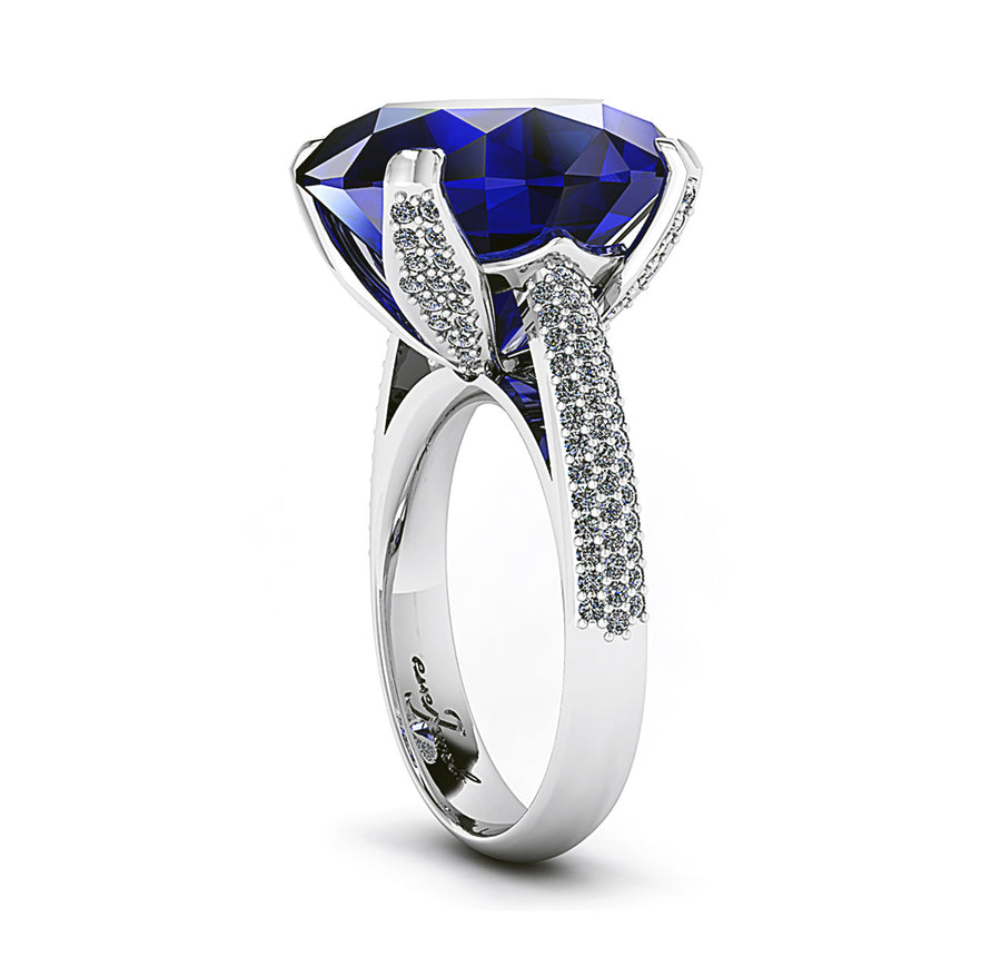 18ct White gold 15ct oval tanzanite dress ring claw set with pave diamonds